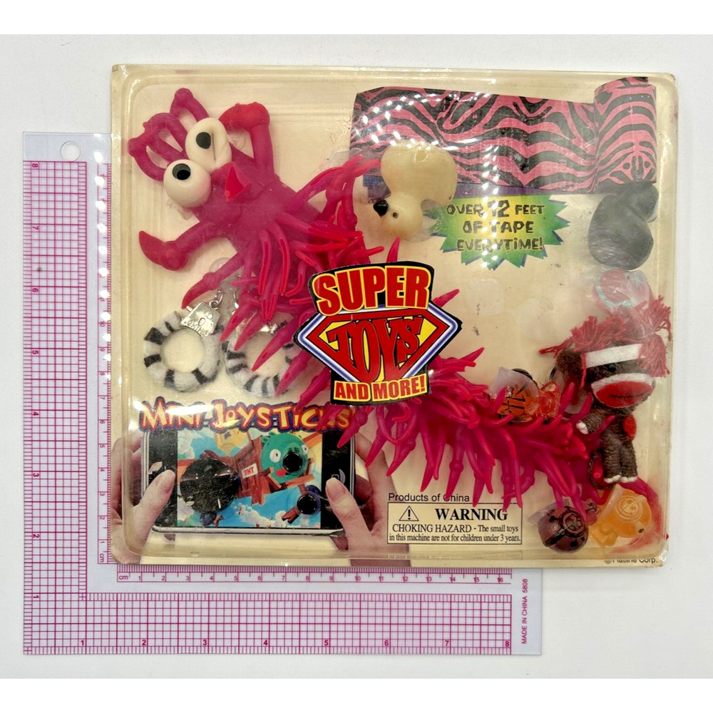 Vintage Vending Display Board Super Toys and More! 0169